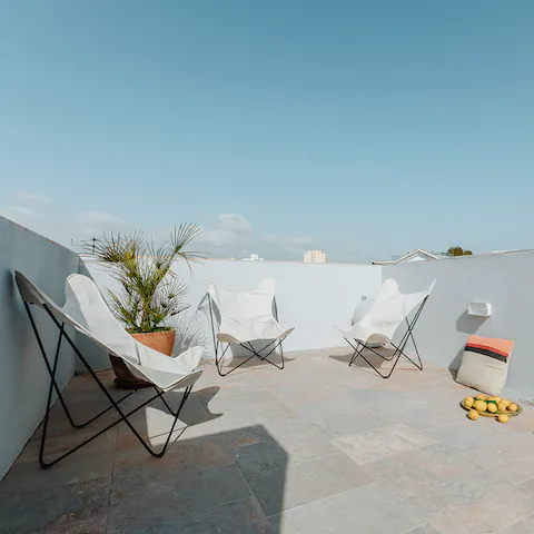 Come together on the shared rooftop terrace to admire the views