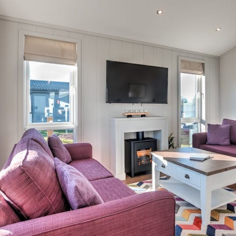 Cuddle up by the electric stove for a cosy evening in