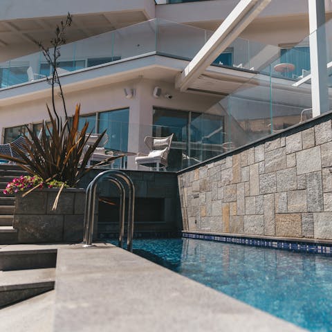 Go for a dip in the villa's private pool