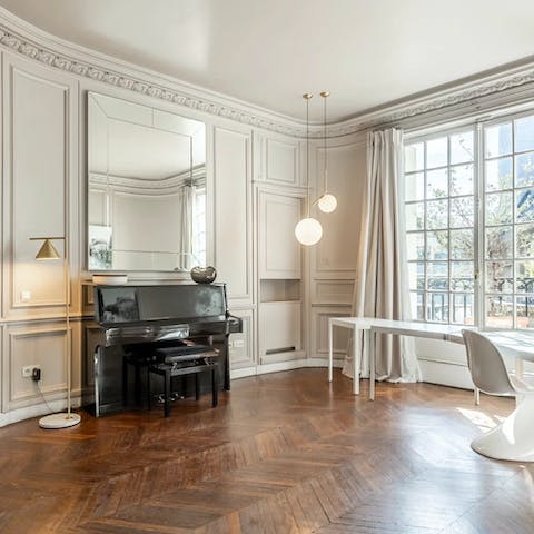 Tickle the ivories of the piano in the sunny recreation room