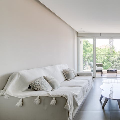 Pour yourself a glass of Israeli wine and relax in the bright living space
