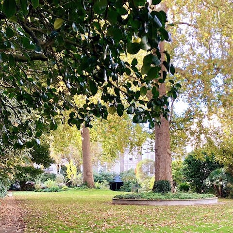 Stroll around the typical Notting Hill communal garden next to the home