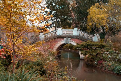 Wander Parc Monceau's romantic follies, ponds, and lush gardens, a two-minute walk