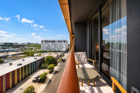 Sit above Wynwood's colourful streets and enjoy a drink on the balcony