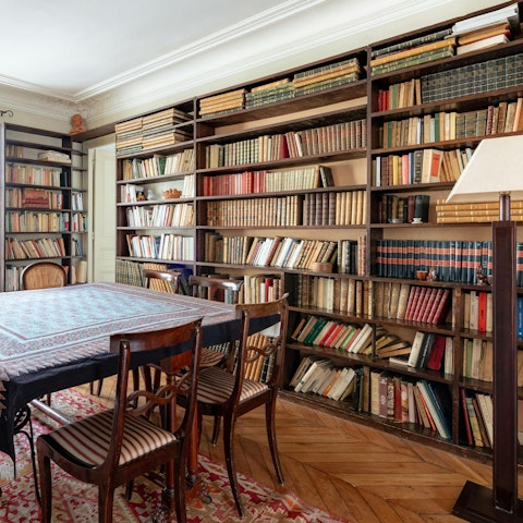 Gather in the book-filled dining room for a French meal