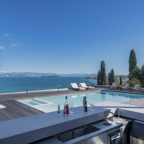 Drink in the sea views from the private pool or outdoor bar