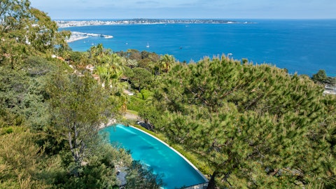Head to the shared pool for a swim above the treeline