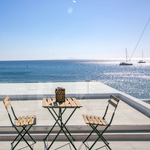 Share a bottle of local wine with your loved one and enjoy stunning sea views