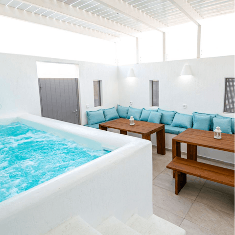 Luxuriate in your sheltered jacuzzi or gather for drinks in the evening