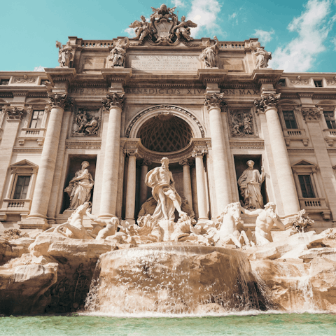 Visit the iconic Trevi fountain, a ten-minute walk away