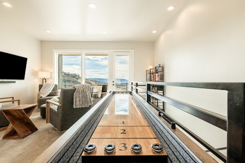 Kick back with a spot of shuffleboard or poker