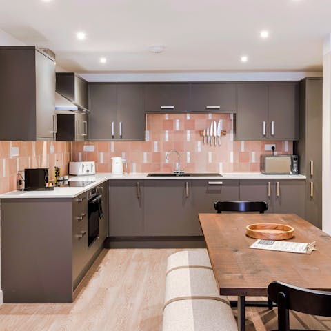 Prepare delicious home-cooked meals in the fully equipped kitchen