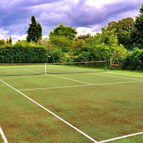 Embrace some friendly competition on the shared tennis court