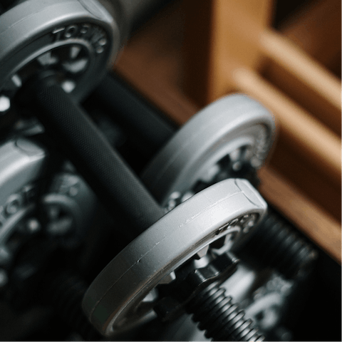 Work up a sweat with the provided weights and yoga mat