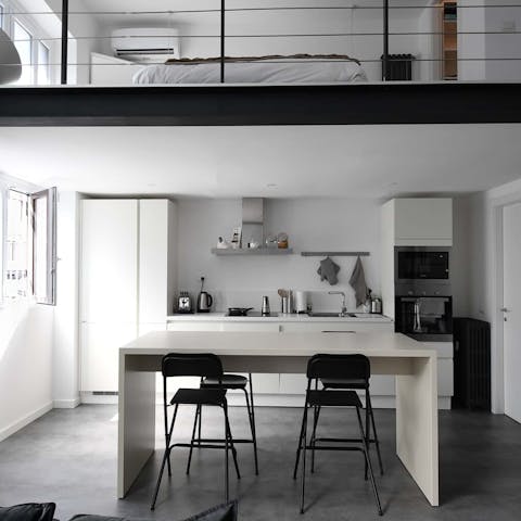 Cook up some rigatoni milano in the sleek kitchen