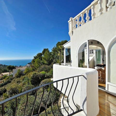 Stroll along the large terrace wrapping around the flat