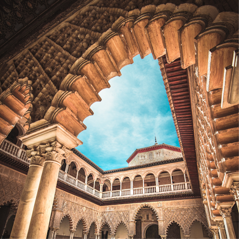 Stroll around the magnificent Royal Alcazar – it's a short walk away