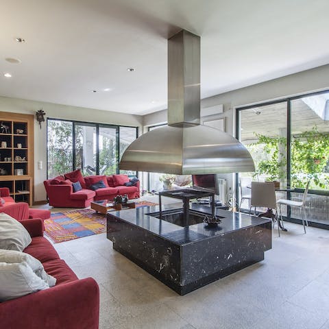 Gather around the striking fireplace on chilly evenings
