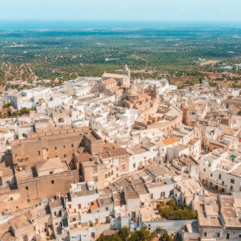Take a day trip to the charming white city of Ostuni