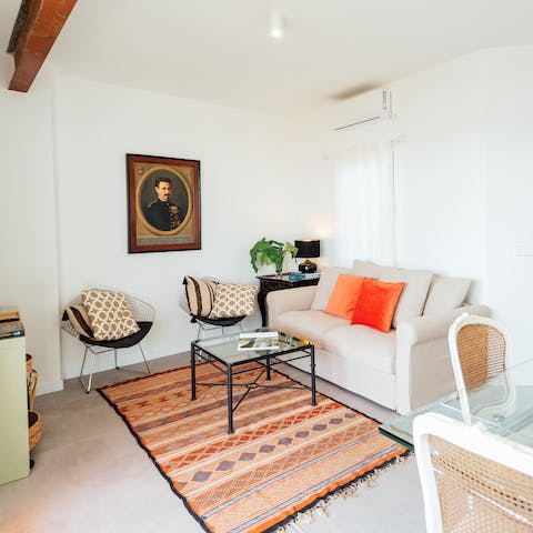 Put your feet up in the living space with a glass of wine at the end of a busy day