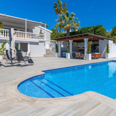 Soak up the Spanish sun from in or beside the private pool