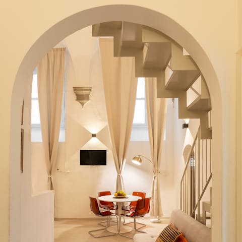 Enjoy aperitifs beneath the historic six-metre high ceilings