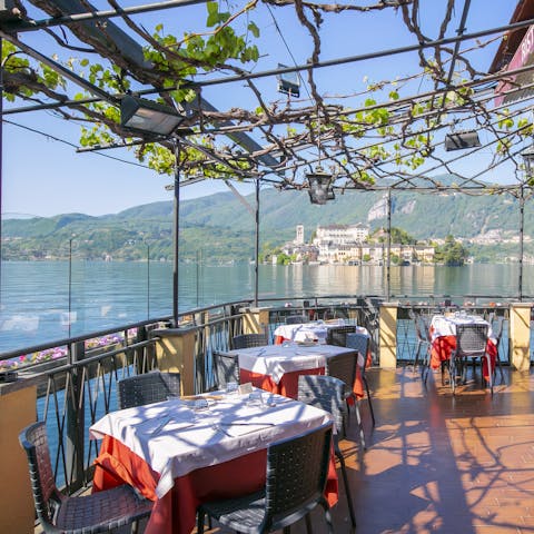 Stroll down into Orta for dinner at a water-edge taverna, just twenty-minutes away