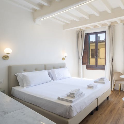 Sink into the cosy bed after a long day of sightseeing