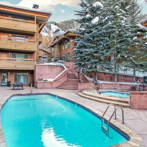 Splash in the communal pool or unwind in the hot tub