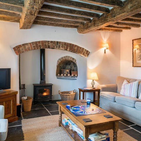 Spend cosy evenings playing games by the wood burning fire