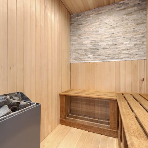 Unwind body and mind in the private sauna