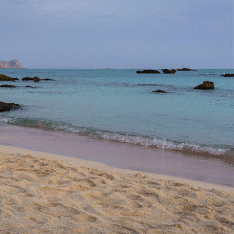 Take a drive to the coast and stroll the sandy shores at Kamari Beach