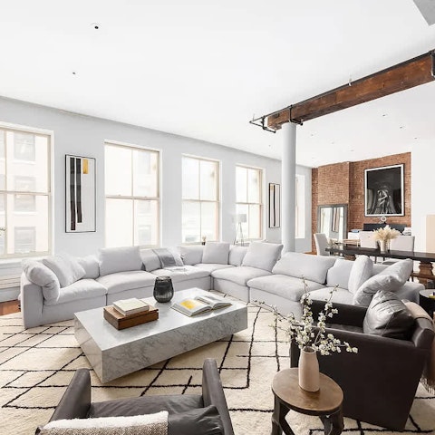 Relax under 12-foot-high ceilings after a day of sightseeing