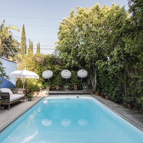 Lounge by the pool in your serene back yard