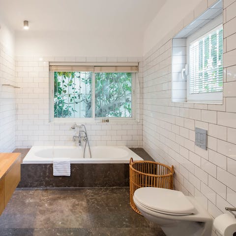 Take your relaxation to the next level with a soak in the sunken tub