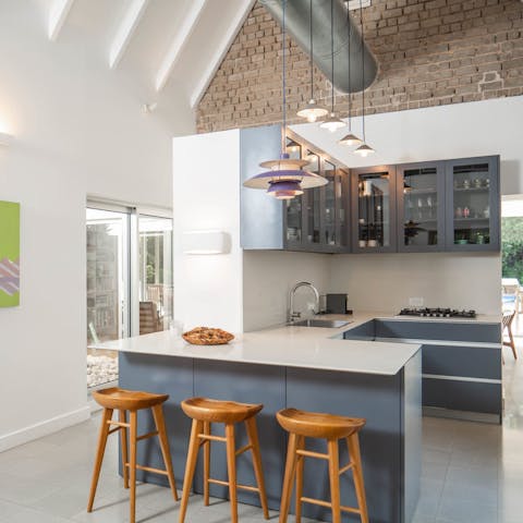 Get to work in the sleek kitchen and enjoy a quick breakfast at the island