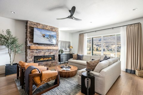 Warm up by the fire as the hillside fills the window