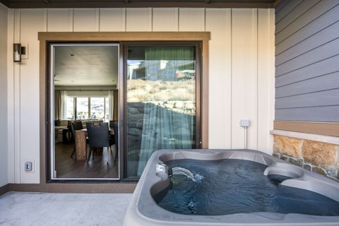 Soak in the hot tub after a day on the pistes