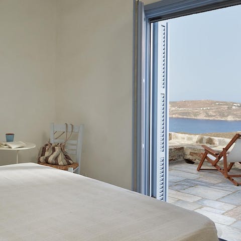 Wake up to dreamlike views of the Aegean Sea