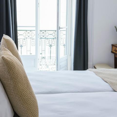 Open the French windows to your bedroom balconette, espresso in hand