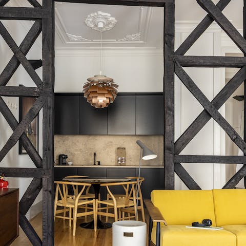 Admire the traditional 'gaiola pombalina' architecture of the apartment