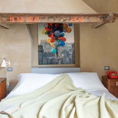 Admire the quirky features in the rustic bedroom