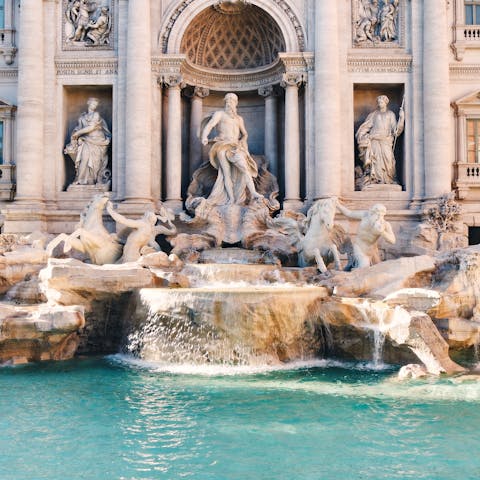 Turn right out of your building and walk just 200 metres to reach the iconic Trevi Fountain