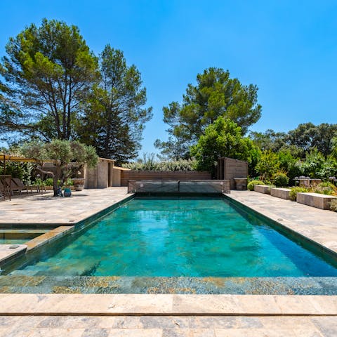 Enjoy blissful days at home relaxing by the pool