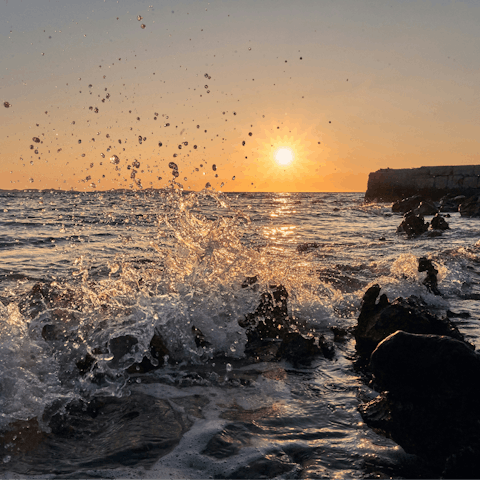 Enjoy a beach sunset on the island of Vir