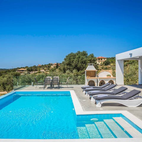 Laze on loungers before a refreshing dip in the water