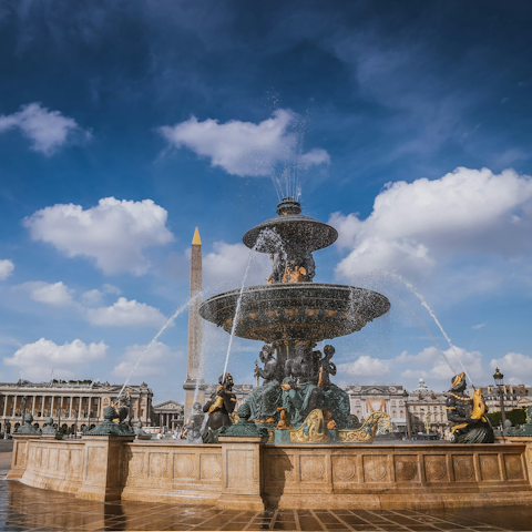 Wander down to the Place de la Concorde, next to the Seine
