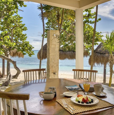 Enjoy all your meals alfresco – your dining table is practically in the sand