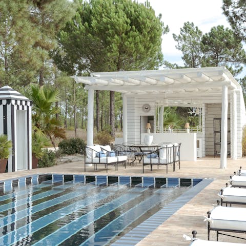 Go for a dip in the pool or relax under the pergola