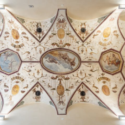 Admire the jaw-dropping frescoes of the historic palazzo